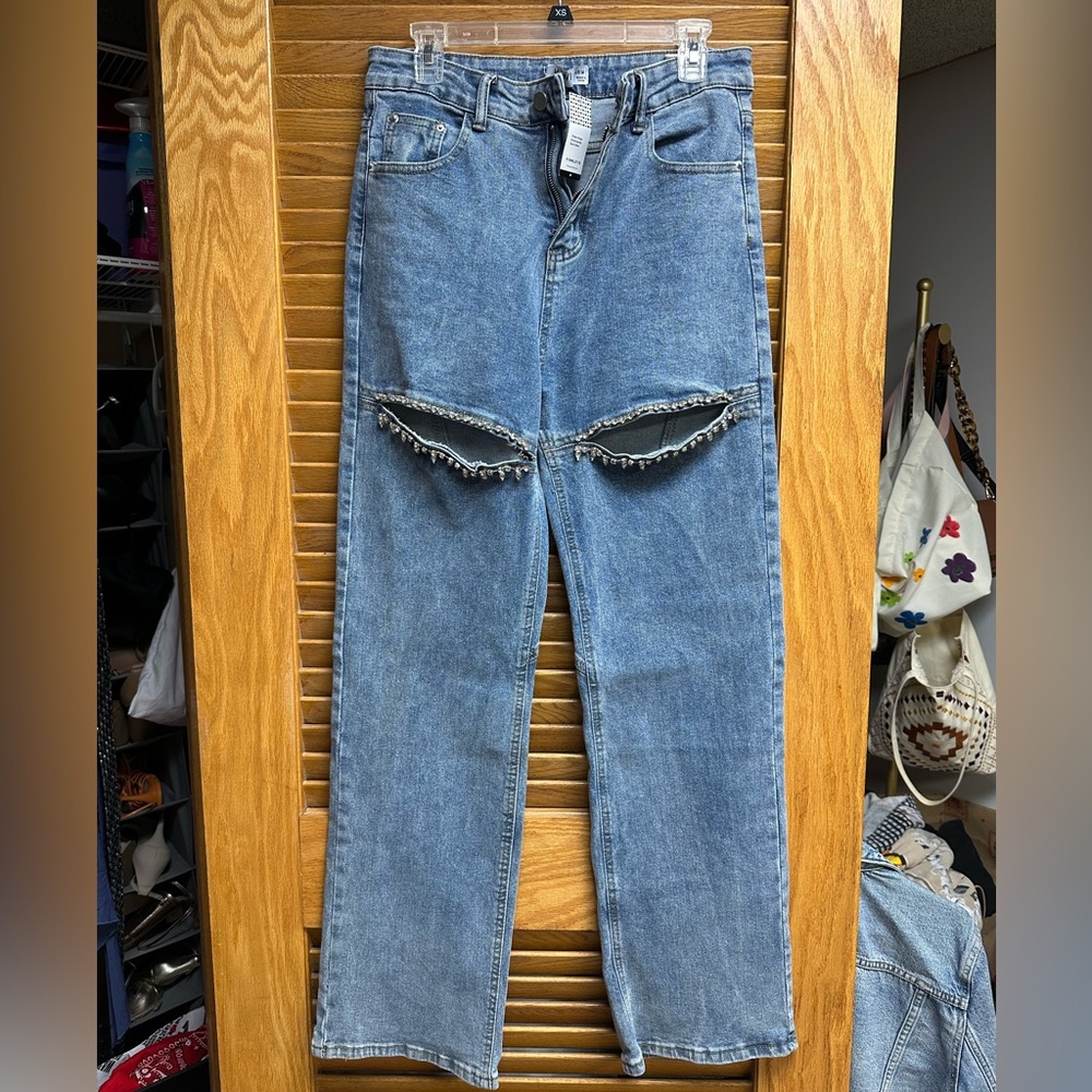 Blue Straight Leg Distressed Jeans with rhinestone cut outs